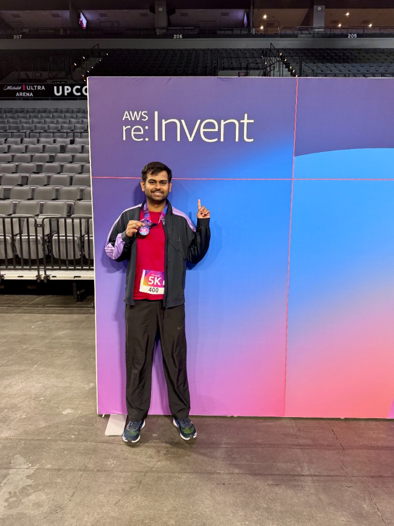 Harsh Akshit celebrating 5K run completion at AWS re:Invent
